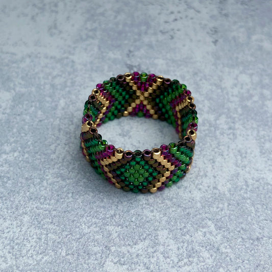 Ring in Gold/Violett/Grün